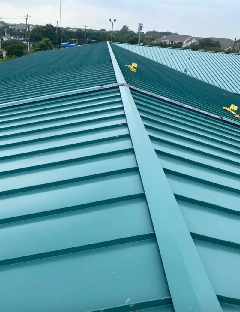 Green commercial metal roof ridge and valley for Metal Roof Repair in Tigard